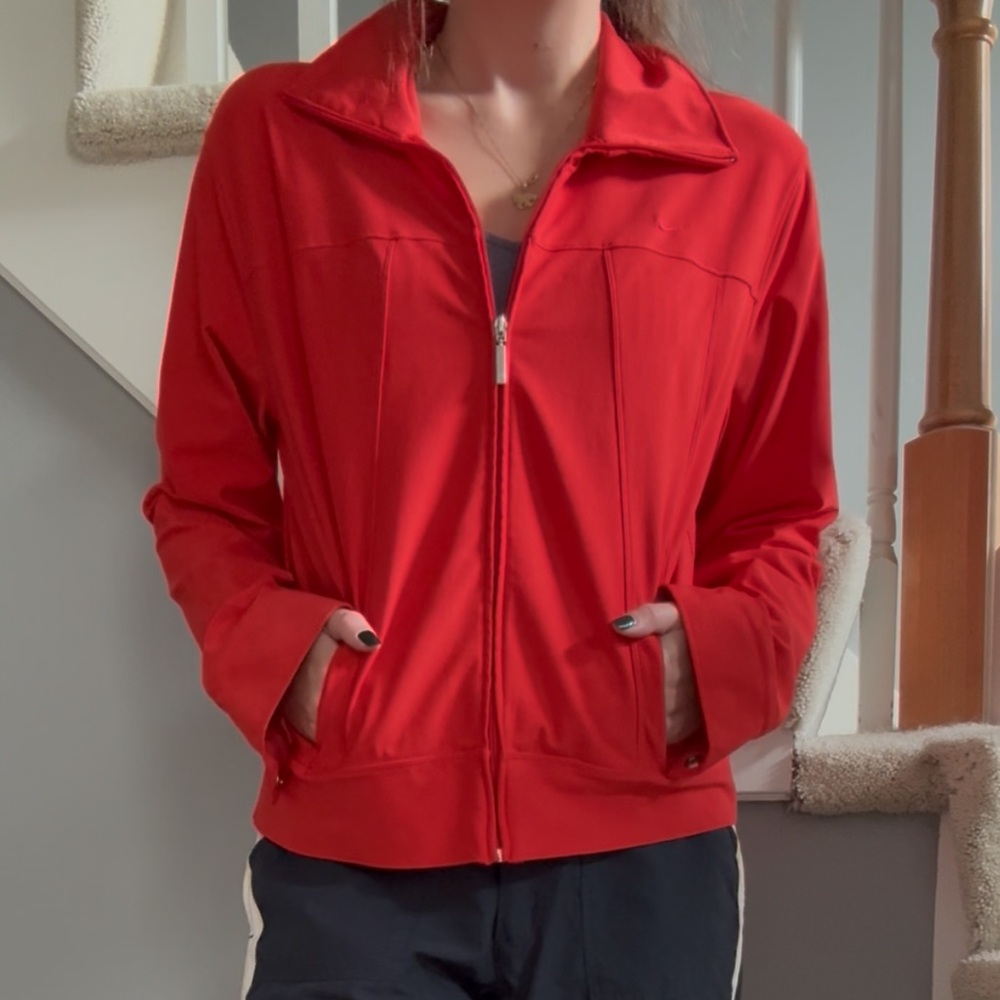 Red Nike zip-up jacket